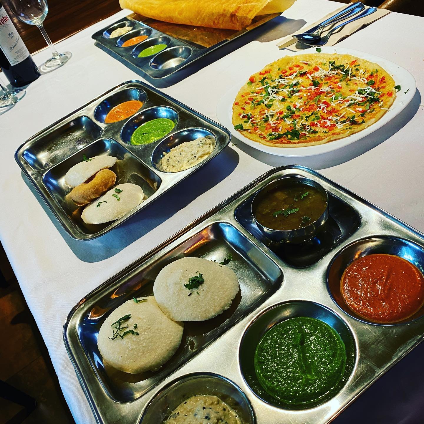 Interior of Bollywood Indian Restaurant in Barcelona, with colorful Bollywood movie posters on the walls