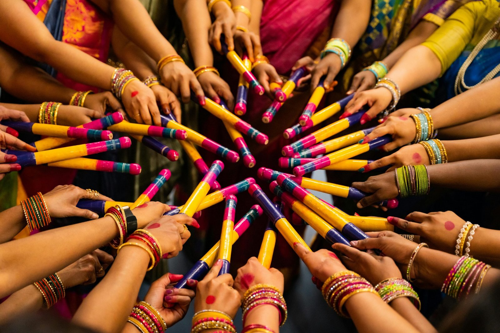 Colorful poster of Dandiya Night 2025 in Barcelona featuring a couple dancing Garba, event details with free entry, and music by DJ Tigerstyle.